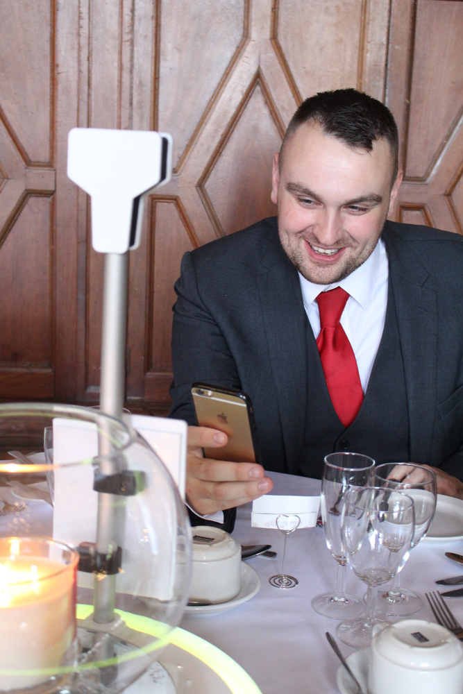 Man uses the new Table Selfie by Photobooths