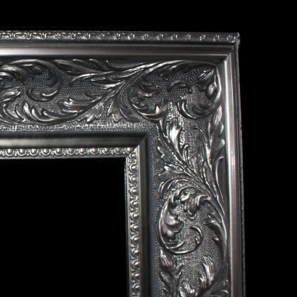 An ornate black and silver frame for Magic Mirrors