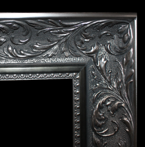 An ornate black and silver frame for Magic Mirrors